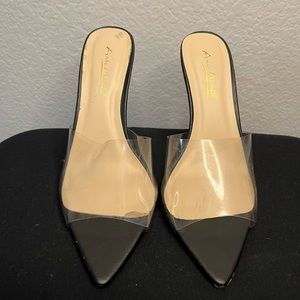 Black Miss Lola Pointed Toe Mules.